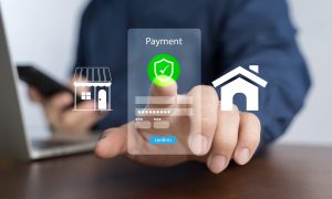 Digital banking network, internet payment, financial technology or FinTech concept. Businessman using smartphone with icons on virtual screen, online shopping and payment via mobile banking apps.